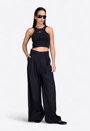 Model wearing black wide-leg linen trousers, full front view – East Vibe